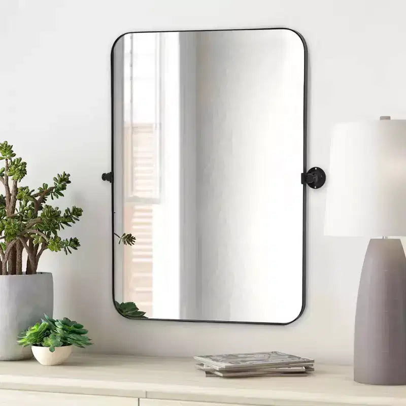 Specchio decorativo rettangolare rotante da parete con cornice moderna in metallo nero e angoli arrotondati 36 x 24 x 2